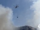 Дикий пожар в центре Москвы на Пресненском Валу: вертолеты тушат огонь